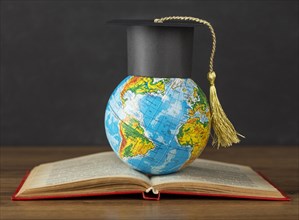 Graduation cap earth globe
