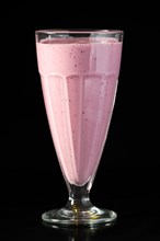Milkshake strawberry summer cocktail isolated on black