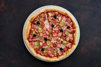 Top view of pizza with defferent kind of sausages