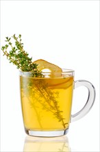 Hot apple winter drink with thyme and ginger
