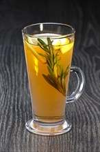 Transparent glass of rosemary
