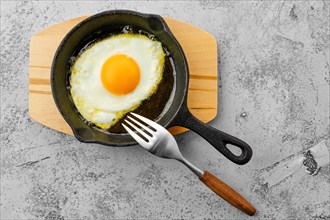 Fried egg in small cast-iron skillet