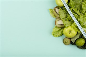 Green fruit with measurement copy space
