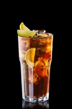 Cold cola with slices of lime and lemon isolated on black background