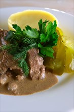 Roasted liver with sauce and mashed potato