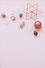 Small christmas toys pink table. Resolution and high quality beautiful photo