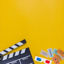 Clapperboard with cinema tickets 3d glasses