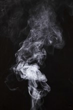 White smoke fragments black background. Resolution and high quality beautiful photo