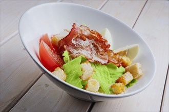 Salad with grilled bacon