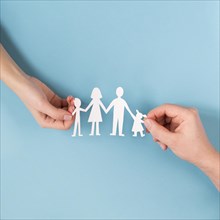 Top view people holding hands cute paper family. Resolution and high quality beautiful photo