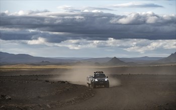 Four-wheel drive vehicle on a track