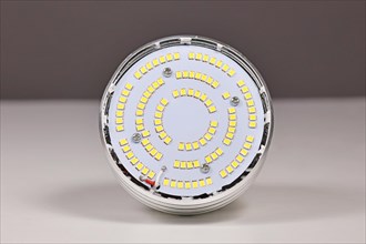 Inside of LED lamp with many small light emitting diodes with lid taken off