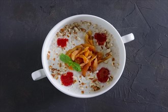 Plate of oatmeal with dried apricots