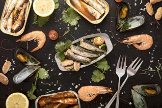 Flat lay assortment seafood with cutlery