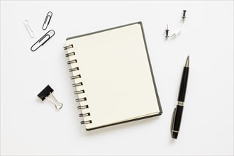 Top view office stationery with notebook paper pins. Resolution and high quality beautiful photo