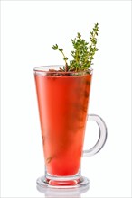 Hot watermelon winter drink with thyme and anise isolated on white