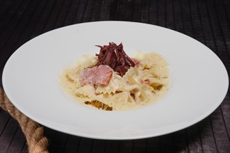 Big plate of pasta with ham