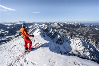 Ski tourers at the summit of Sonntagshorn