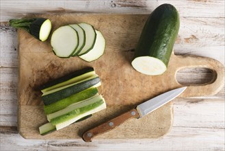 Top view sliced zucchini little knife. Resolution and high quality beautiful photo