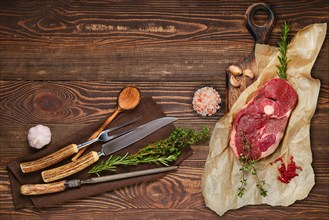 Raw fresh beef center cut leg steak with fork