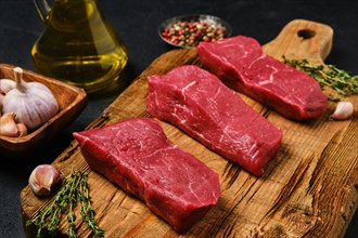 Closeup view of raw boneless strip steak loin with spice