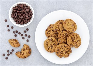 Flat lay cookies chocolate chips bowl