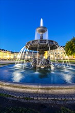 Schlossplatz with fountain and Neues Schloss travel by night in Stuttgart