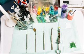 Dentist tools on the table. Top view of stomatologist tools on table. Set of dental tools on dentist's panel. Close up of dental tools on dentist table