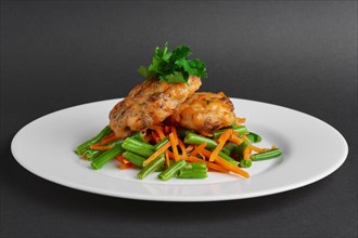Fish cutlet with green bean and carrot