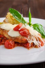 Soft focus photo of roasted chicken fillet with tomato cherry