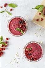 Flat lay smoothie glasses with fruits