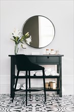 Black cupboard with mirror