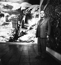 The artist and inventor of political photomontage John Haertfield at an exhibition of his works in 1964 in East Berlin