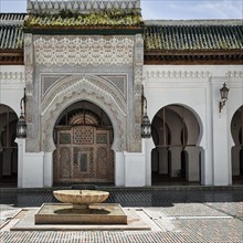 Inner courtyard with fountain and gate