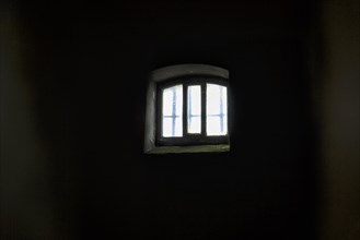View into dark prison cell