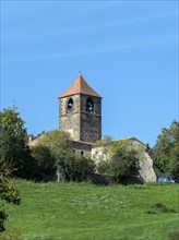 Bell tower of Blassac church. Haute-Loire department. Auvergne-RhoneAlpes. France