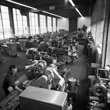 Older workers are retrained in metal trades as locksmiths and lathe operators in the Krupp AG workshops in Bochum in 1967