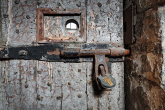 Door of a prison cell with bolt