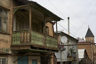 Typical house with wooden balcony
