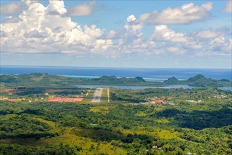 Bird's eye view of approach to runway landing strip of Palau Koror Roman Tmetuchl International Airport ROR