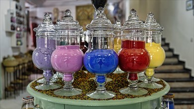 Coloured powder in jars