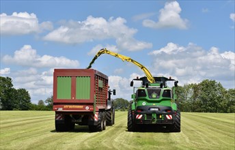Tractor with trailer is needed for grass harvesting