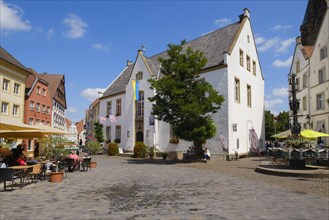 Historic town hall and street cafe on the market square