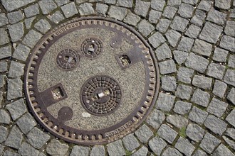 Manhole cover with enclosed three cover