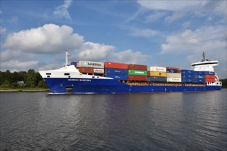 Container ship Heinrich Schepers sails through the Kiel Canal