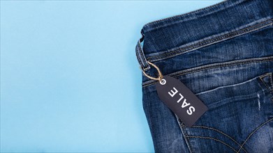 Jeans with black friday tag attached
