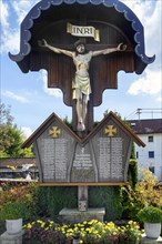 War memorial with crucifix at the church of St. Martin