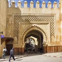 Monumental city gate with ornaments