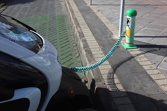 Electric car at the charging station