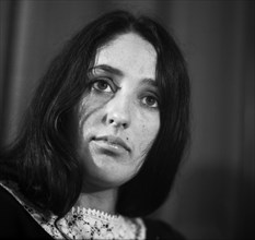 The presence and performance of US singer Joan Baez